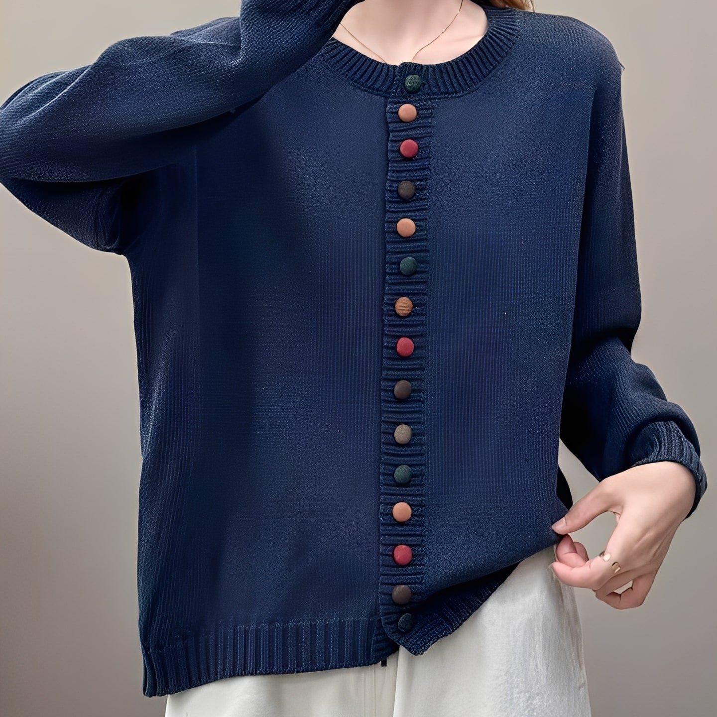 Damski sweter zapinany elegancki z ozdobnymi guzikami stylowy