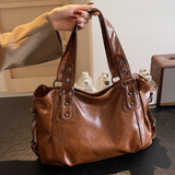 Miękka skórzana torba shopper z regulowanymi paskami