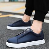 Męskie skórzane sneakersy w bieli, granacie i czerni