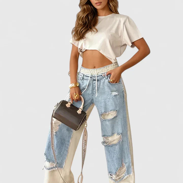 Damskie Jeansy Oversize z Przetarciami i Elastycznym Pasem
