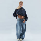 Bluza oversize z kapturem, nadrukiem i kieszenią kangurką