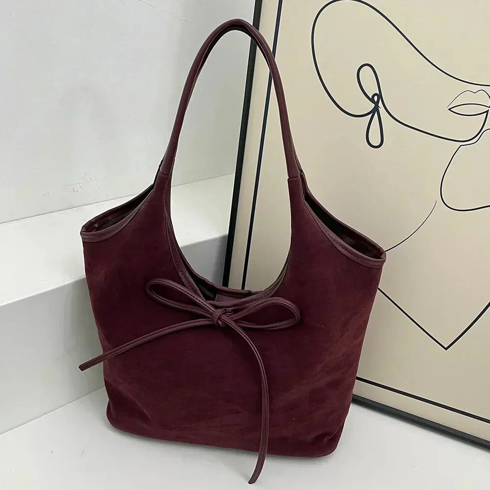 Elegancka Torebka Damska Hobo z Kokardką Minimalistyczna