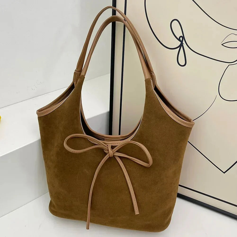 Elegancka Torebka Damska Hobo z Kokardką Minimalistyczna