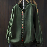 Damski sweter zapinany elegancki z ozdobnymi guzikami stylowy